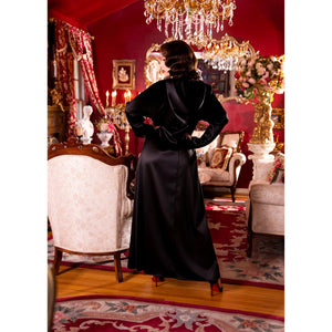 Black satin hooded gown.