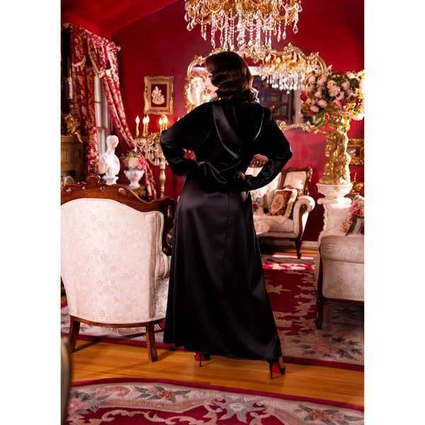 Black satin hooded gown.