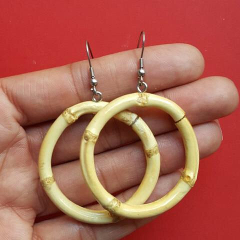 
            
                Load image into Gallery viewer, Tiki bamboo hoop earrings - Small round
            
        