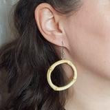 
            
                Load image into Gallery viewer, Tiki bamboo hoop earrings - Small round
            
        