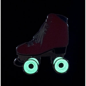 Pink roller skate pin with glow in the dark wheels